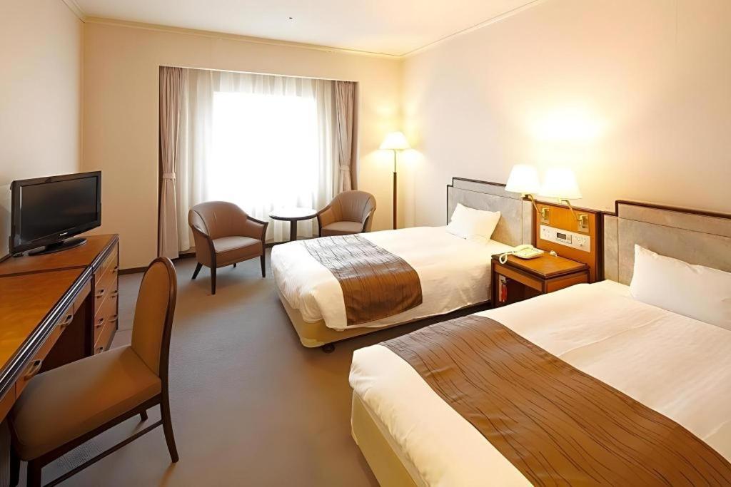 Hotel New Omi Omihachiman Esterno foto